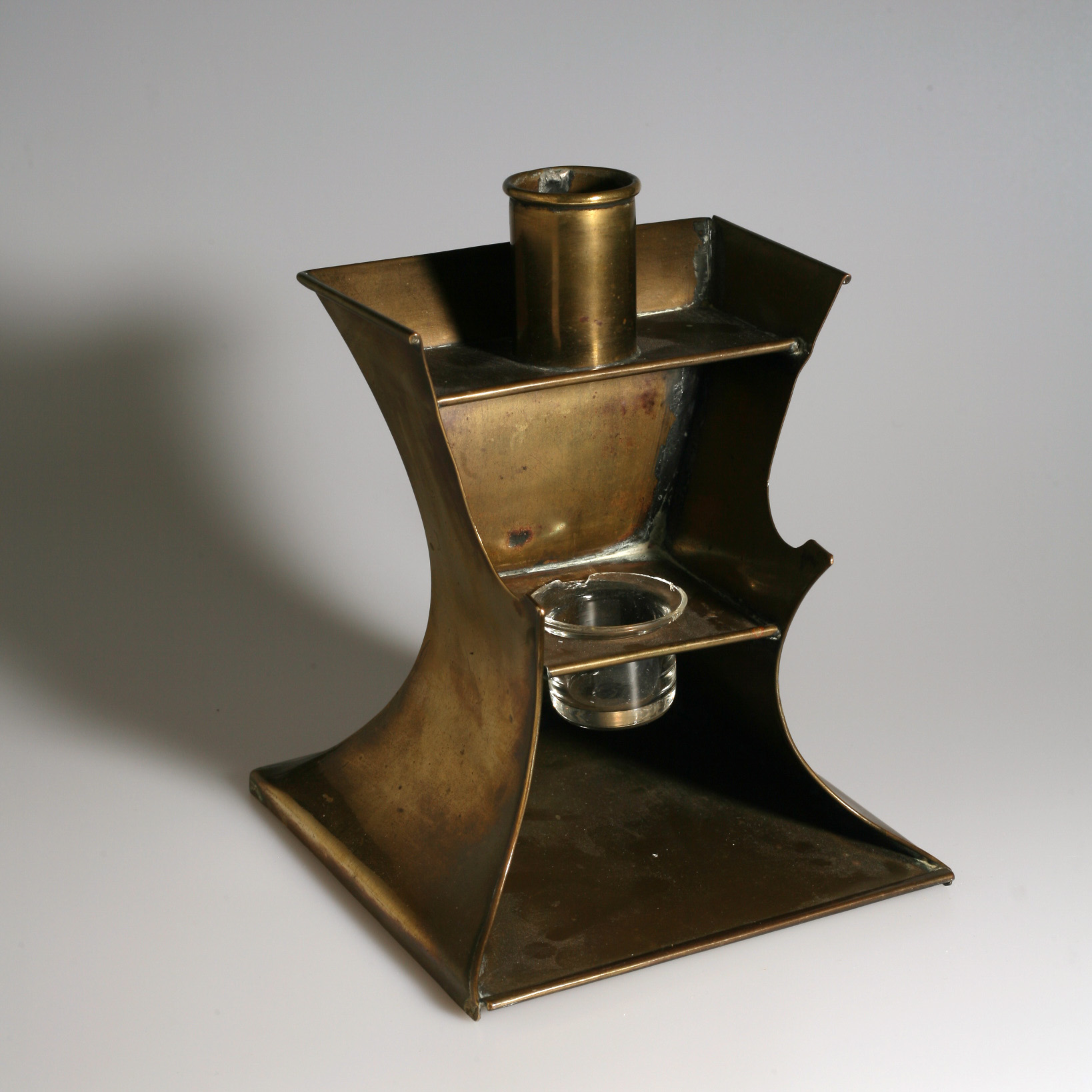 Appraisal: DUTCH BRASS CANDLESTICK AND INKSTAND Of rectangular waisted form the