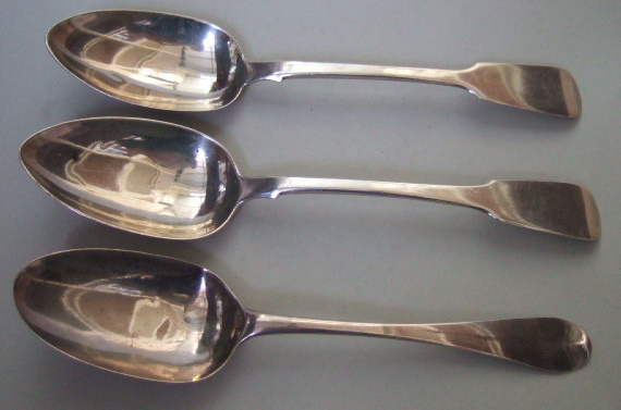 Appraisal: Two silver fiddle pattern table spoons London and London and