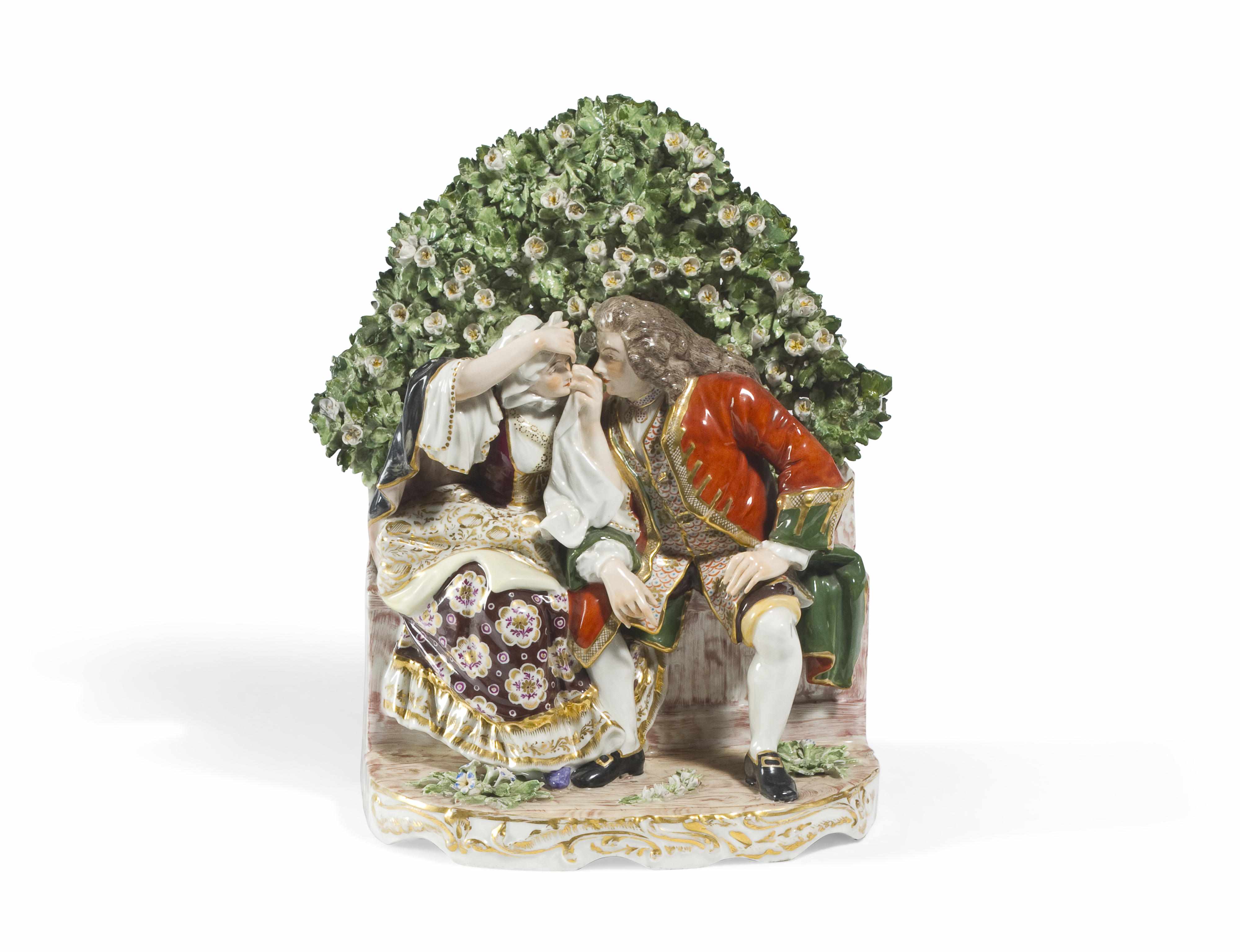 Appraisal: An English porcelain bocage figural group th centuryheight in width