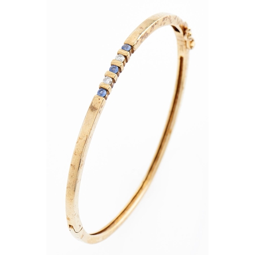 Appraisal: A sapphire and diamond bangle in ct gold g More