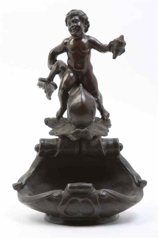 Appraisal: A French Bronze Figural Fountain with a putto atop a