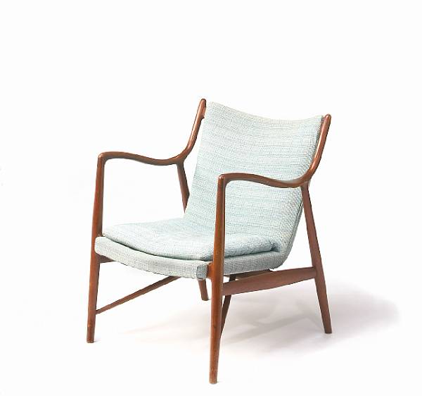 Appraisal: A Finn Juhl teak easy chair produced by Niels Vodder