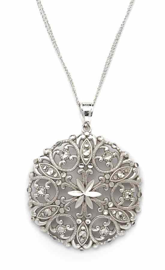 Appraisal: A Karat White Gold Filigree Pendent measuring approximately mm in