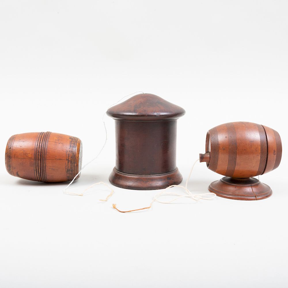 Appraisal: Two Carved Wood String Jacks and a Barrel Form Box