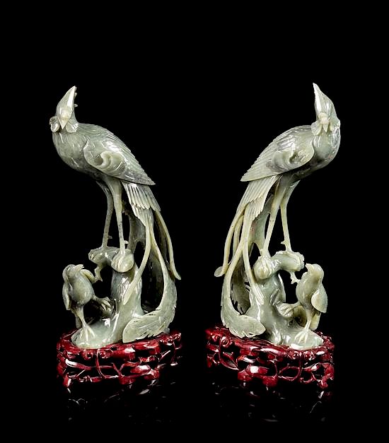 Appraisal: A Pair of Spinach Jade Figures of Pheasants Height of