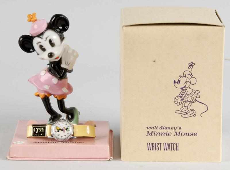 Appraisal: Disney Timex Minnie Mouse Wristwatch on Stand Description Working Watch