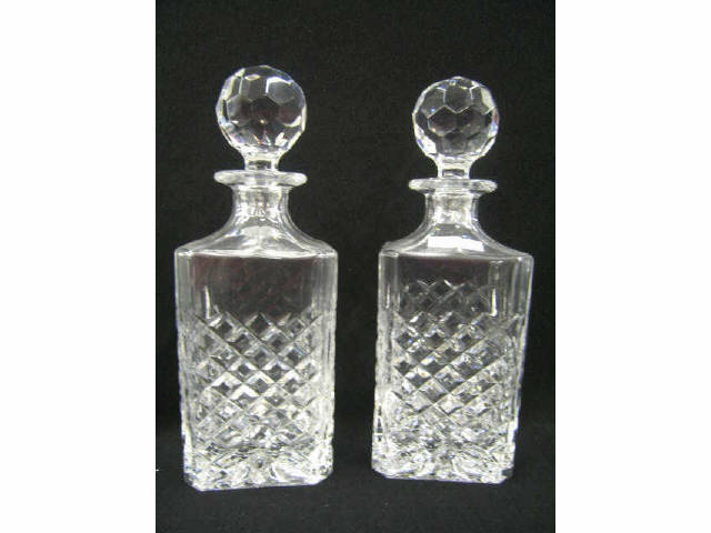 Appraisal: Pair of Cut Crystal Decanters diamond design