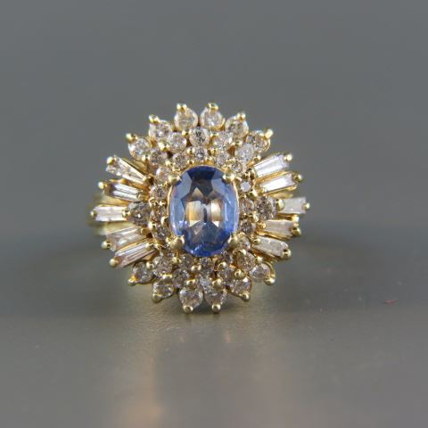 Appraisal: Sapphire Diamond Ring elegant blue oval gem weighing carat surrounded