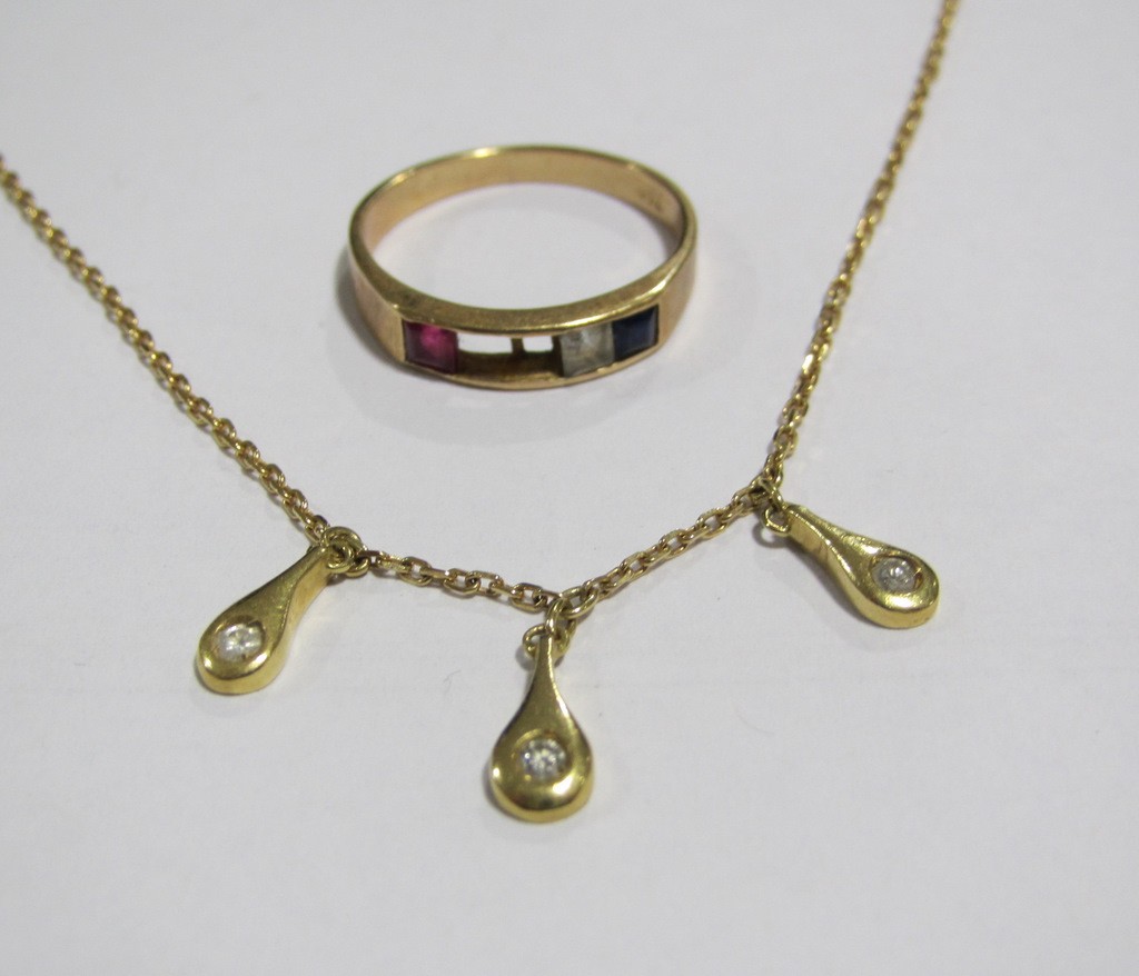 Appraisal: Eighteen carat gold neckchain with three diamond set pendant drops