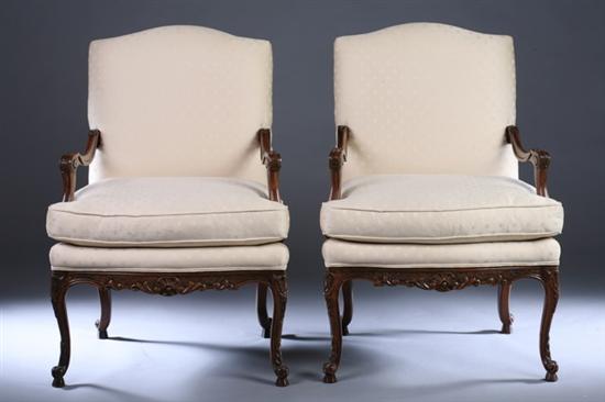 Appraisal: PAIR REGENCE STYLE CARVED FRUITWOOD FAUTEUILS Late th century Baker