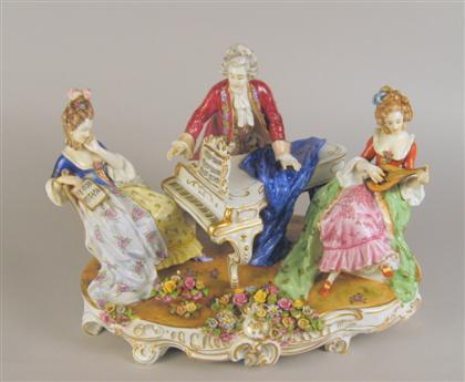 Appraisal: German porcelain figural group Modeled as three figures in th