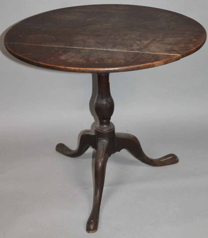 Appraisal: A late thC oak plank top occasional table the circular