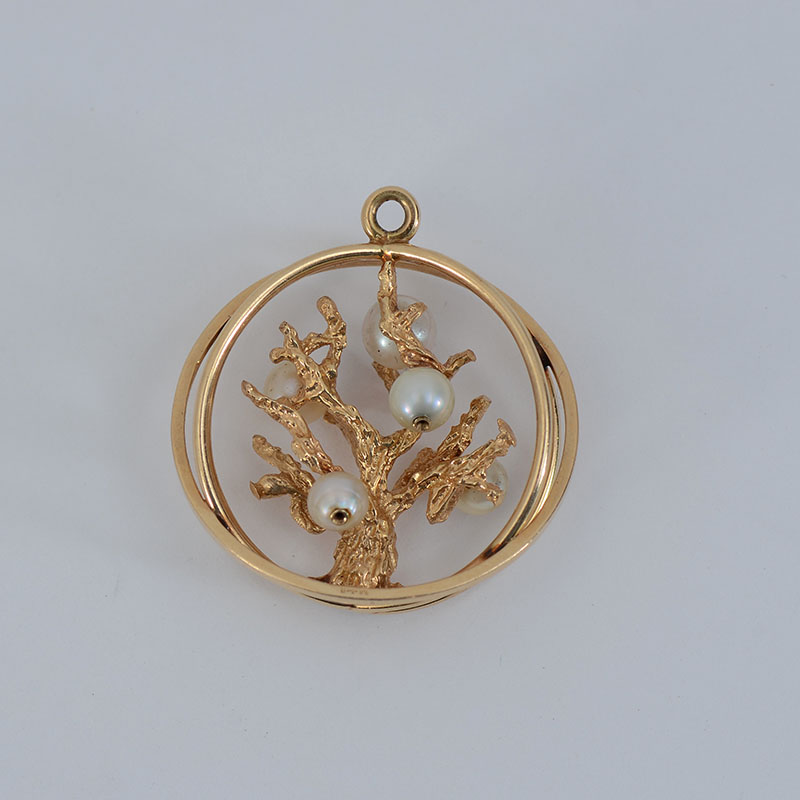 Appraisal: K PEARL TREE IN CIRCLE PENDANT cultured pearls hang from