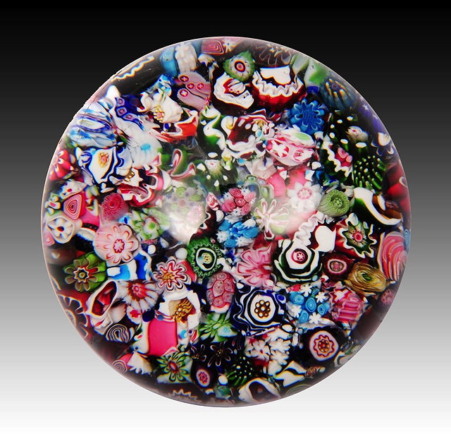 Appraisal: A MILLEFIORI PAPERWEIGHT probably Clichy with slightly scrambled close packed