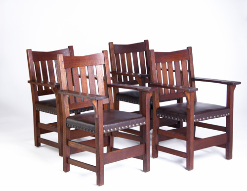 Appraisal: GUSTAV STICKLEY Set of four V-back armchairs with five vertical