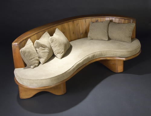 Appraisal: WHARTON ESHERICK Curvilinear poplar sofa with sculpted and paneled back