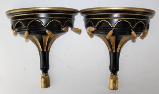 Appraisal: Pair of black and gold painted wall brackets Pair of