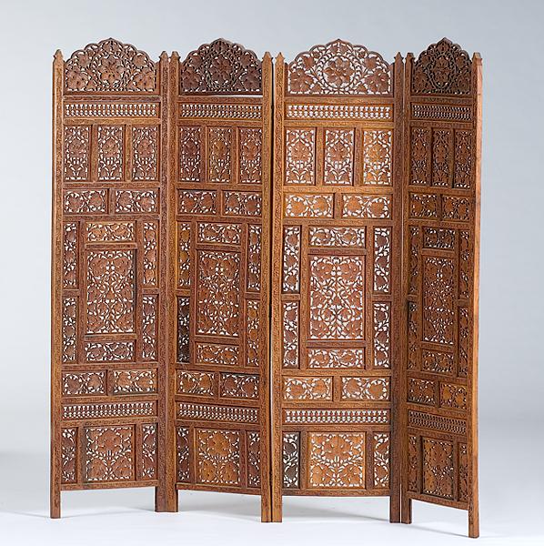 Appraisal: INDIAN CARVED FOLDING SCREEN th century an Indian intricately carved