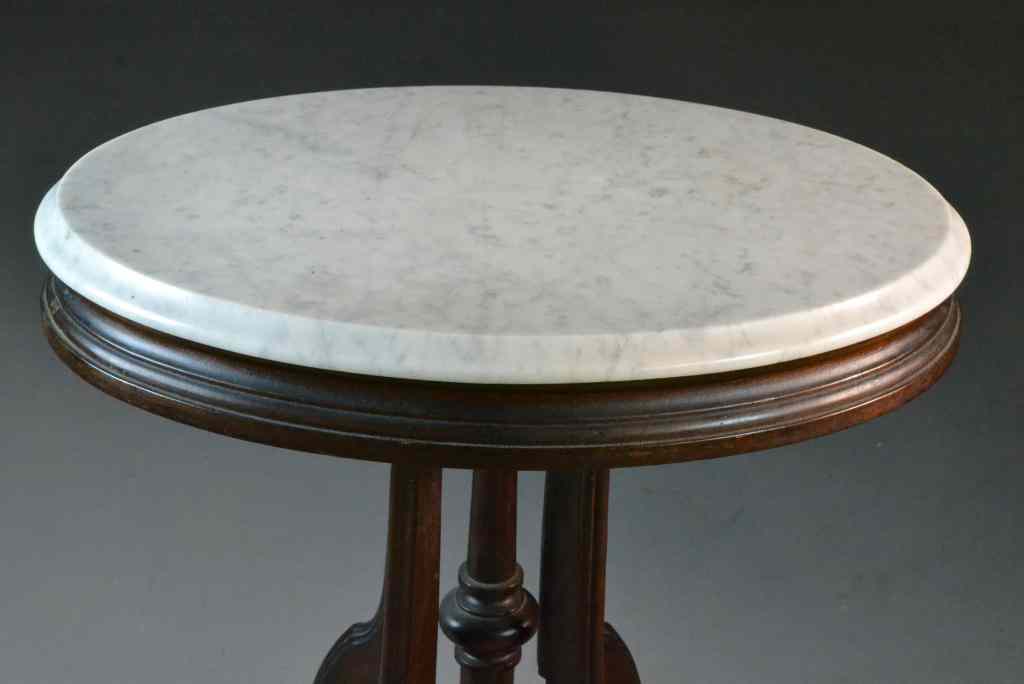 Appraisal: Victorian Marble and Mahogany Side TableWhite and gray oval marble