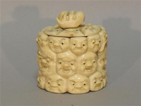 Appraisal: JAPANESE IVORY BOX AND COVER Meiji period of cylindrical oval