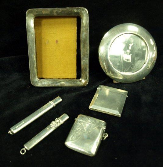 Appraisal: Two silver vesta cases two pencil cases and two silver