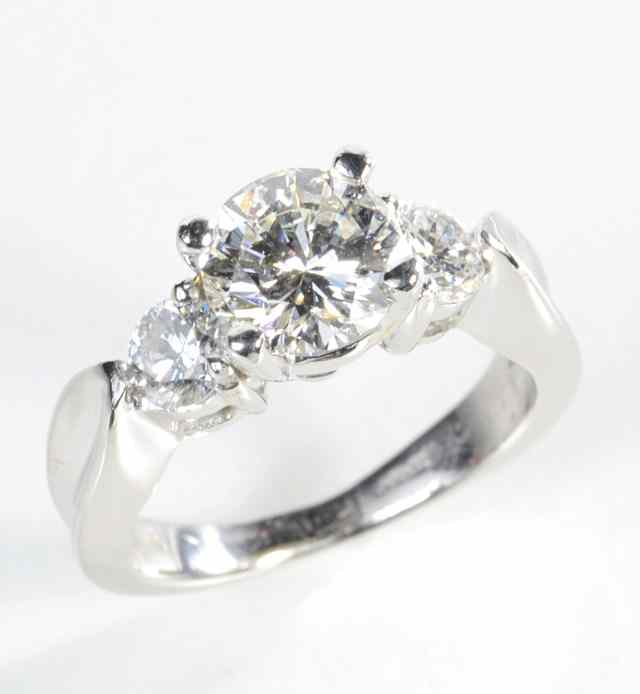 Appraisal: DIAMOND PLATINUM AND WHITE GOLD RING The platinum and k