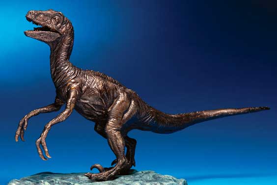 Appraisal: BRONZE SCULPTURE OF VELOCIRAPTOR Artist Victor M Pracas The artist