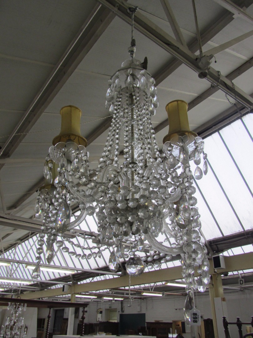 Appraisal: A six branch glass chandelier th century the domed finial