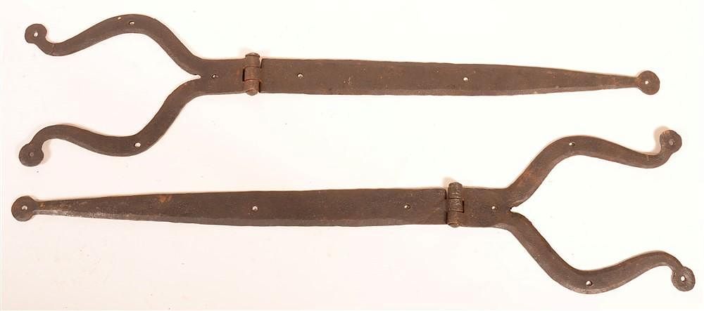 Appraisal: Pair of Wrought Iron Ram's Horn Strap Hinges Pair of