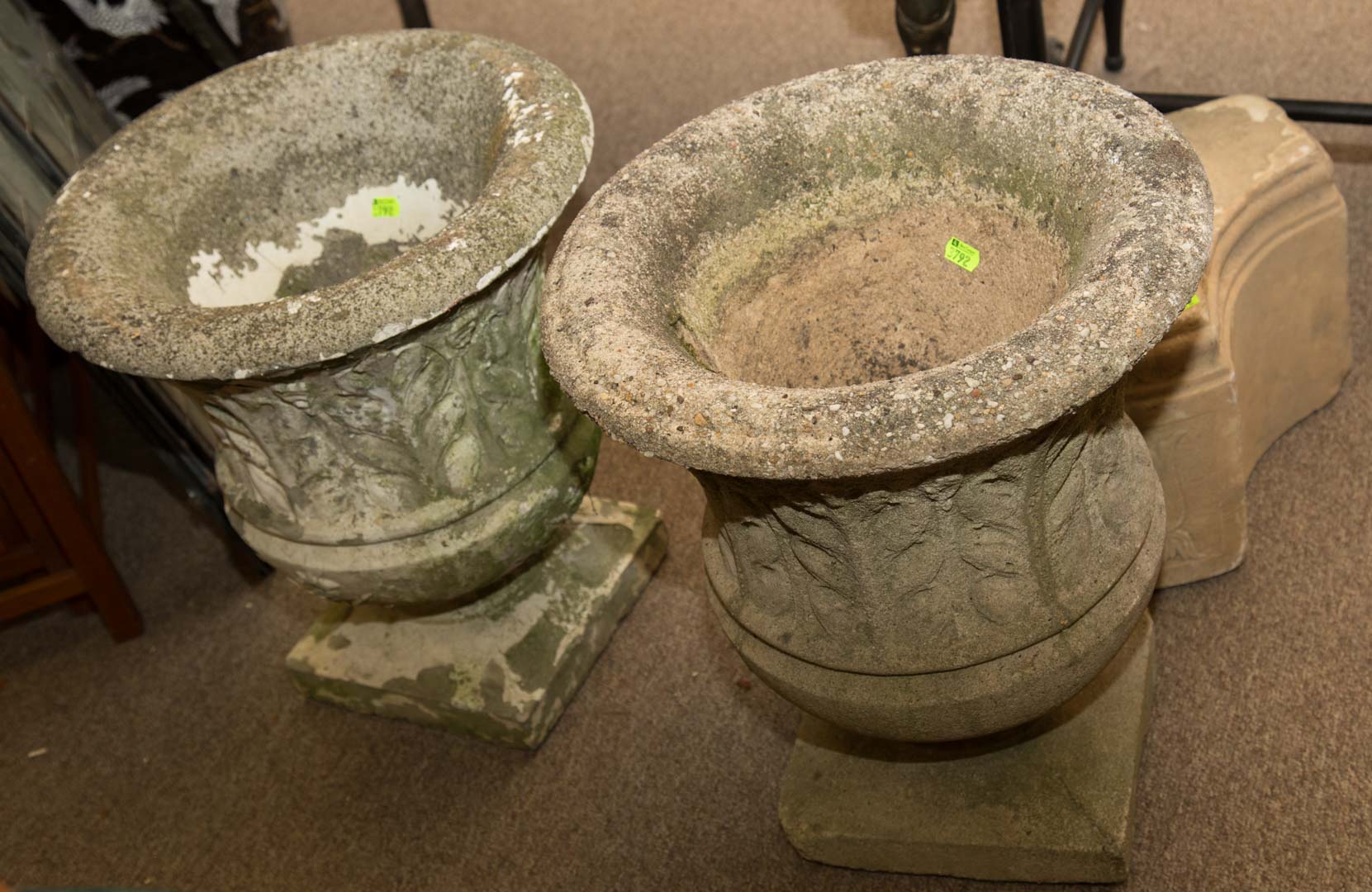 Appraisal: Three garden items including two concrete urns and a possible