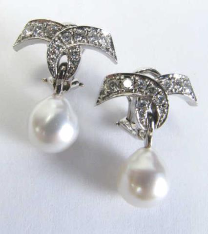 Appraisal: A pair of K white gold pearl drop diamond bow