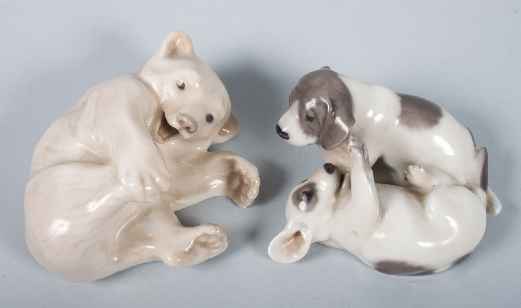 Appraisal: Two Royal Copenhagen porcelain animals Polar Bear Cub in L