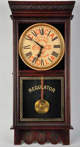 Appraisal: Coca-Cola Ingraham Store Regulator Clock Clock face appears to be