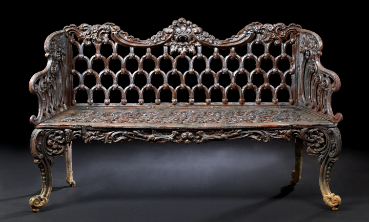 Appraisal: English Gothic-Style Cast-Iron Garden Bench the crest rail sloping arms