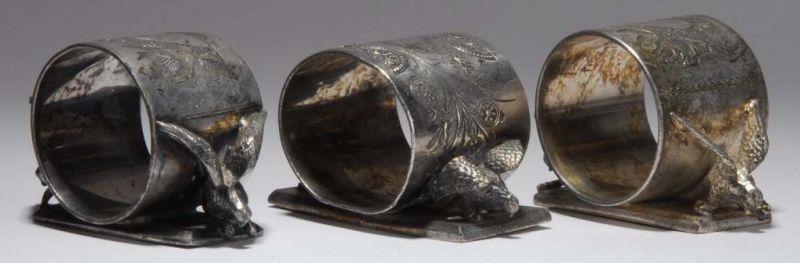 Appraisal: Lot of Double Bird Figural Napkin Rings Description Three of