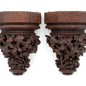 Appraisal: A Pair of Renaissance Revival Carved Oak Wall Brackets Circa