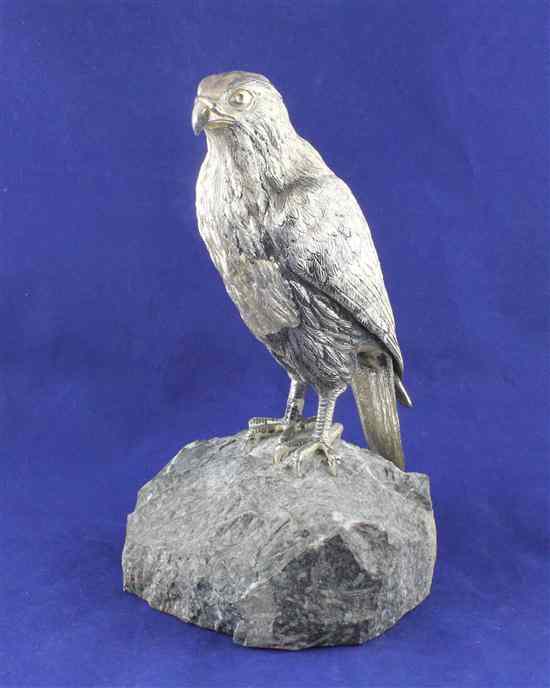 Appraisal: A modern silver model of a sparrow hawk with textured