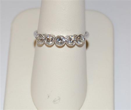 Appraisal: A diamond five-stone ring millegrain collet set with uniform round