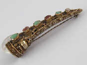 Appraisal: A Chinese brooch designed as an ornamental nail extension set