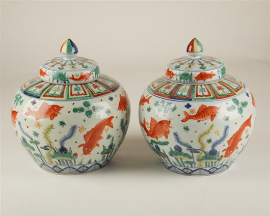 Appraisal: A Pair of Chinese Covered Pots each having a goldfish