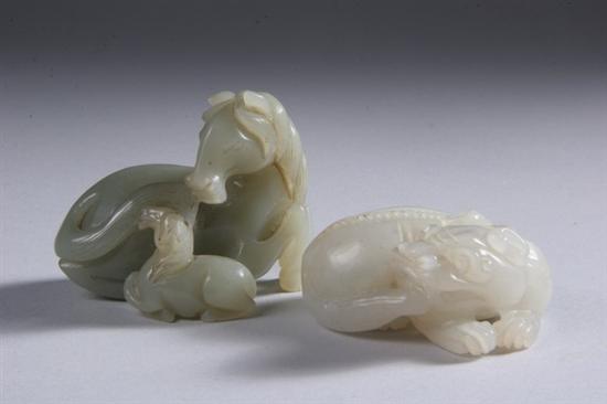 Appraisal: TWO CHINESE JADE CARVINGS Late th century One white jade