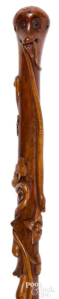 Appraisal: Carved maple walking stick ca Carved maple walking stick ca