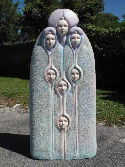 Appraisal: Sergio Bustamante ceramic sculpture Depicts many faces in pastel colors