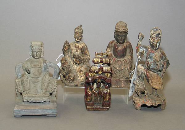 Appraisal: A group of five wood carvings Comprised of two deities