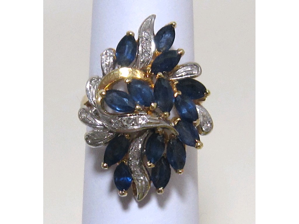 Appraisal: Fourteen carat gold sapphire and diamond set dress ring with