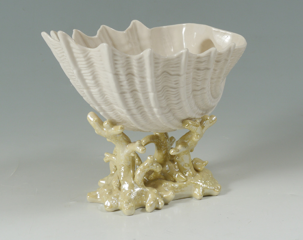 Appraisal: IRISH BELLEEK PORCELAIN CARDIUM SHELL On yellow luster coral Green