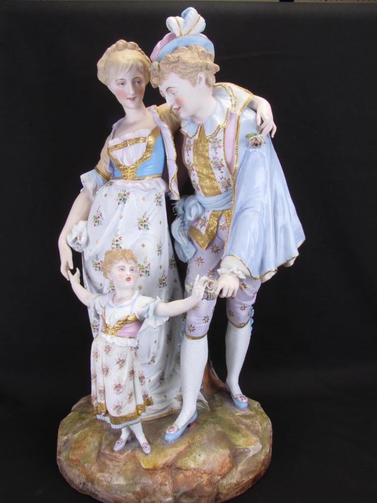 Appraisal: A French bisque porcelain figural grouping depicting parents and child