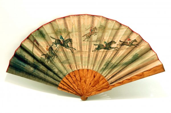 Appraisal: A folding hand fan Wood guards and sticks with grain