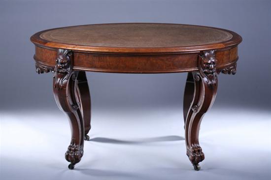 Appraisal: RENAISSANCE REVIVAL MIXED WOOD OVAL PARTNER'S WRITING TABLE th Century