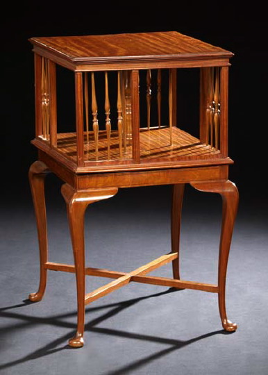 Appraisal: Edwardian Satinwood Revolving Bookmill ca the banded square top above